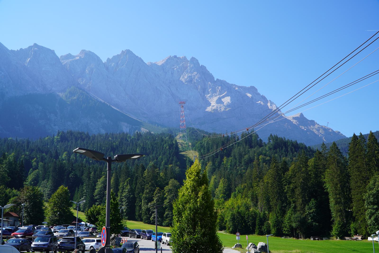 Cable car ascending Zugspitze, Germany's highest mountain, with the test site visible on the slopes above