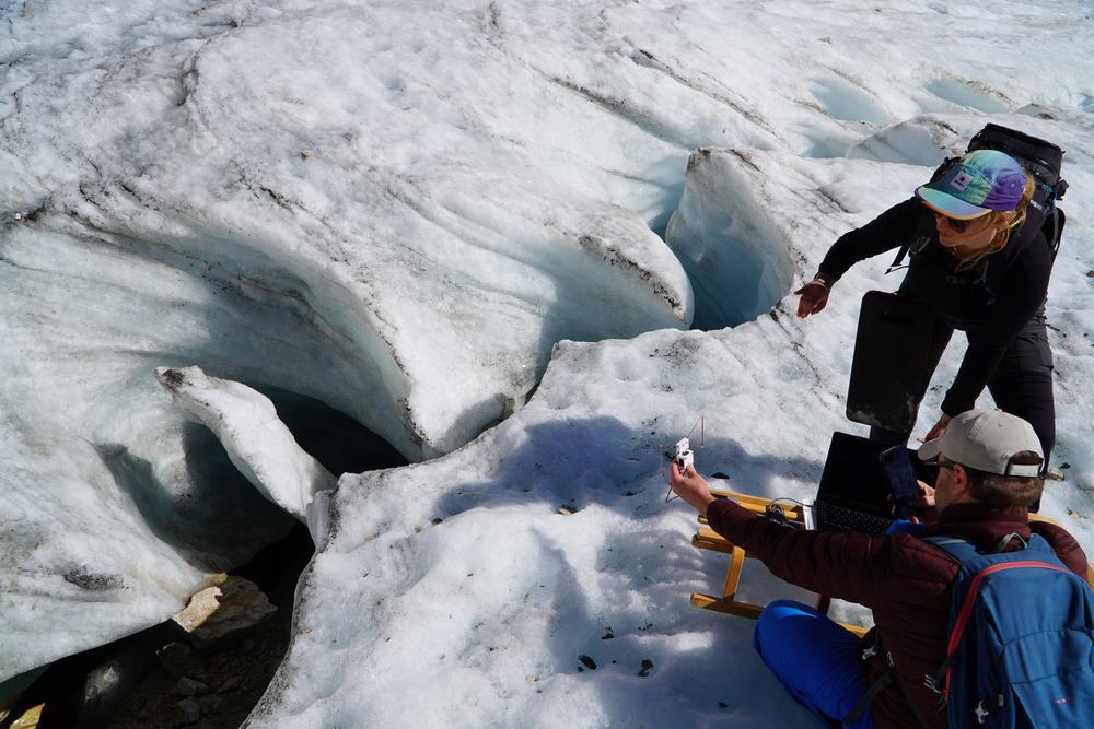 The Ryme team examining ice structure at close range near a crevasse