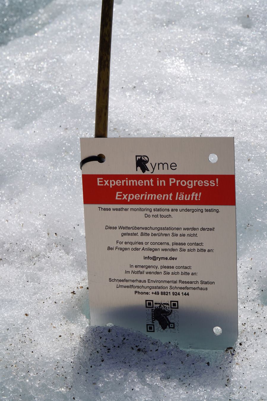 A Ryme experiment-in-progress sign marking the test site on the glacier
